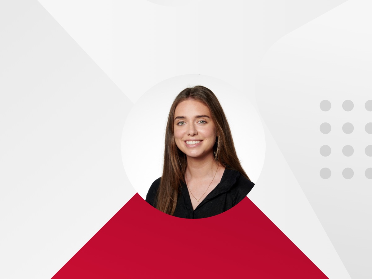 kaitlyn's head shot with white and red background