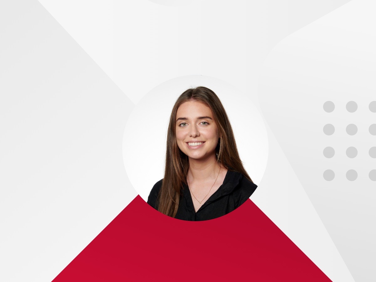 Kaitlyn's head shot with white and red background