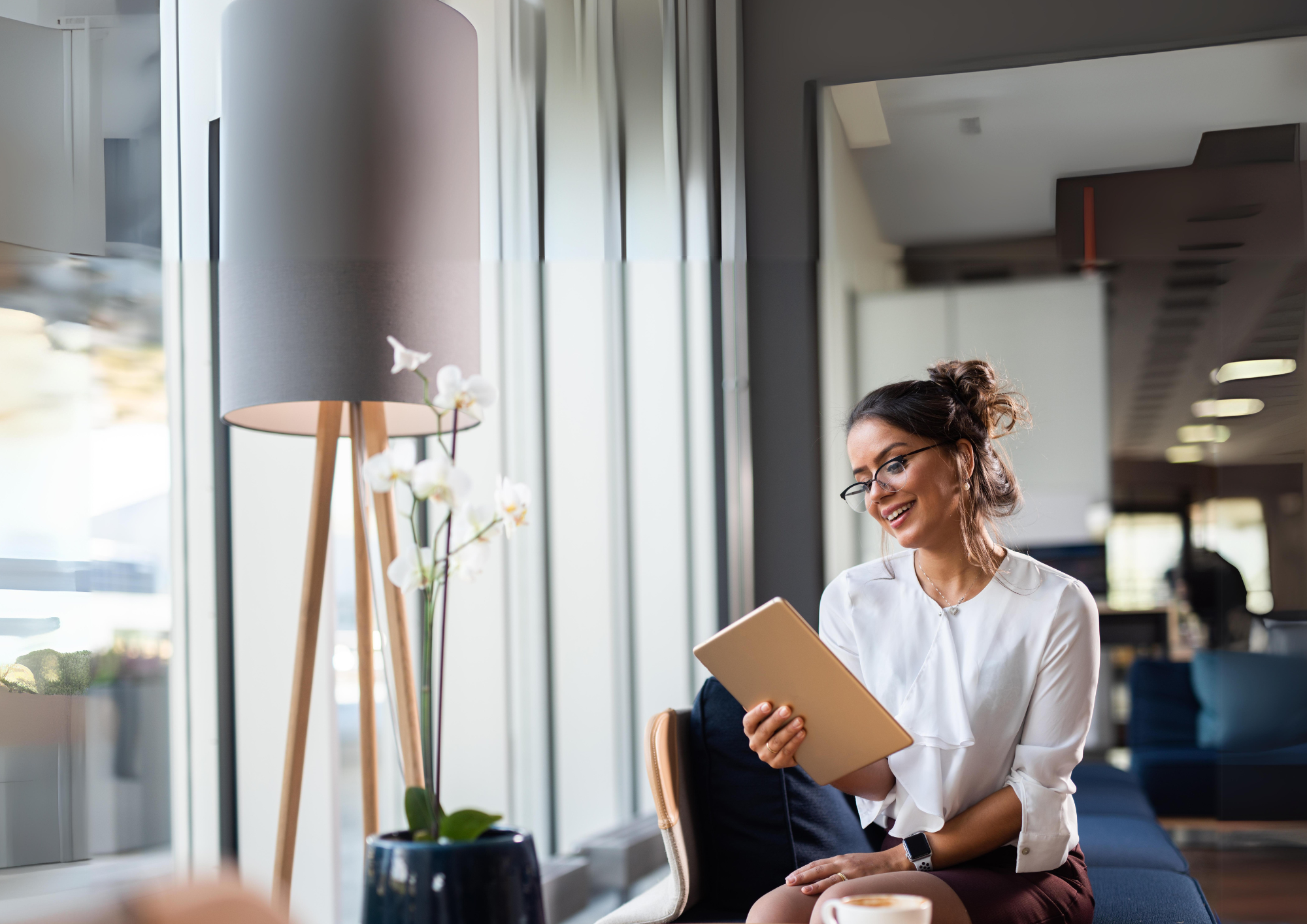 Women Smiling while reading Best Practice Customer Onboarding Checklist